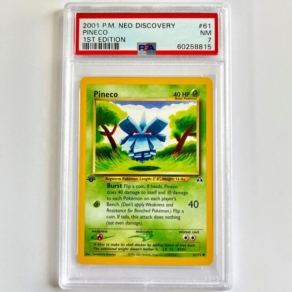 PSA 7 Pineco Near Mint 61/75 Neo Discovery 1st Edition 2001 Pokémon 60258815 - Picture 1 of 2